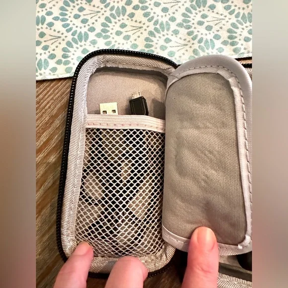 San disk MP3 player and case. Great condition except clip broke on back